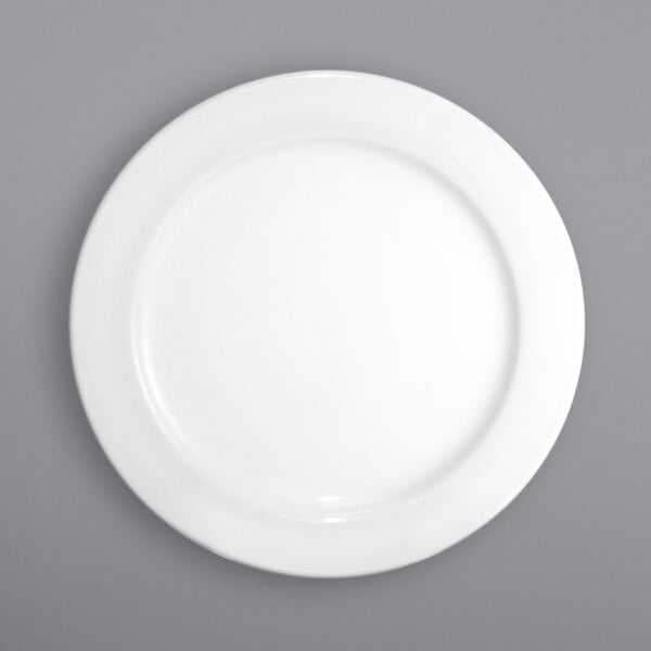 A white plate with no food on it.