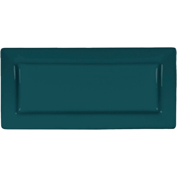 A rectangular porcelain platter with a blue rim.