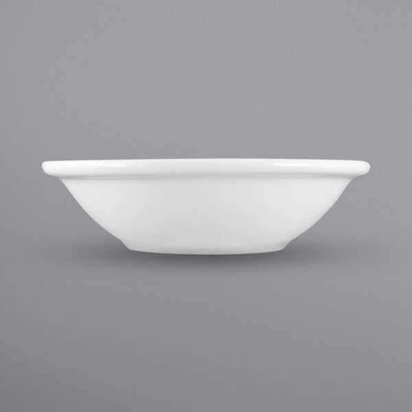 a white bowl on a gray background