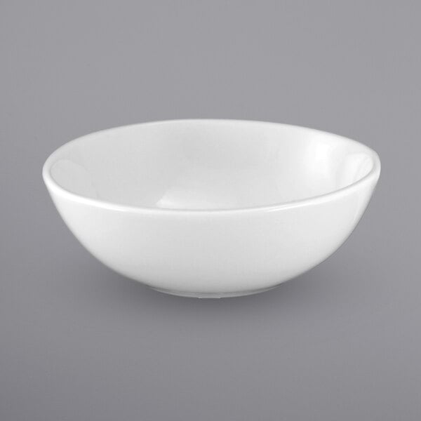 a white bowl on a gray background