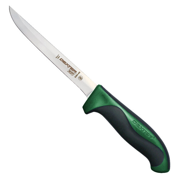 a knife with a green handle
