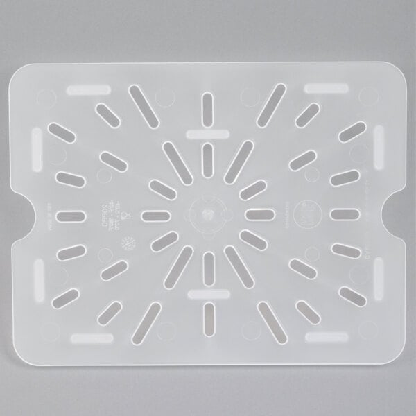 A white plastic tray with holes.