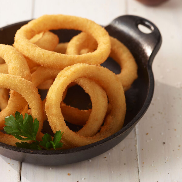 Golden Dipt plain breaded fried onion rings on a white plate.