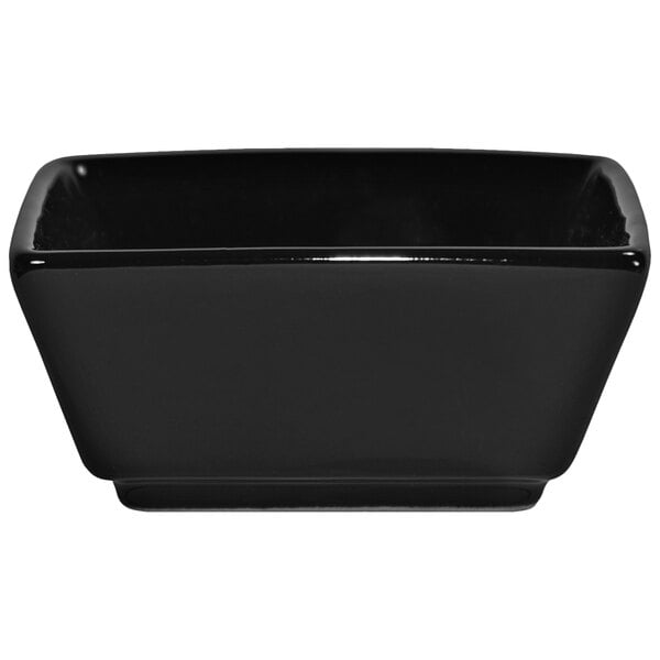 A black square porcelain ramekin.