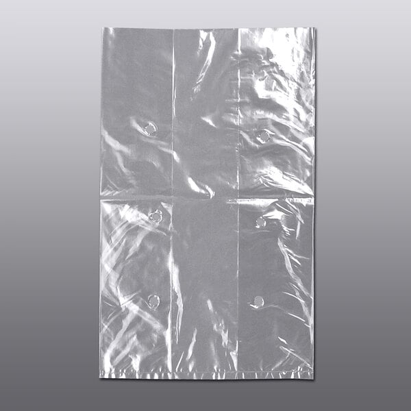 A close-up of a 7" x 5" x 11" clear Low Density Polyethylene lettuce bag with vent holes.