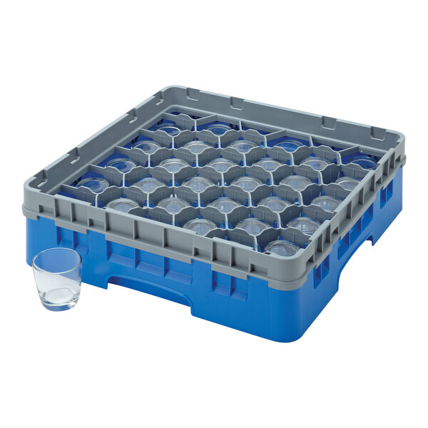 A blue Cambro plastic rack holding clear glasses.