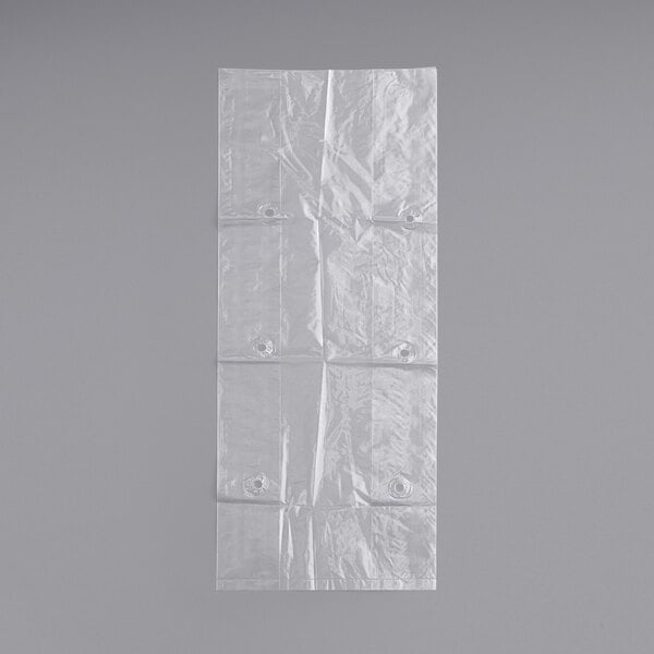 A close-up of a clear plastic low density vented produce bag with holes.