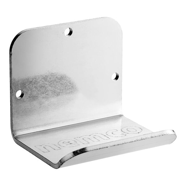 A stainless steel hands-free foot door opener with mounting holes and the brand name 'Nemco' engraved on the surface.