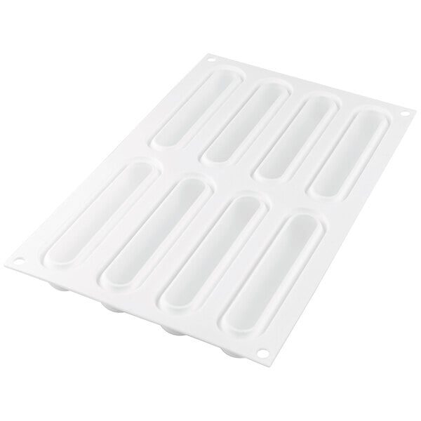 a white plastic tray with a few rectangular holes