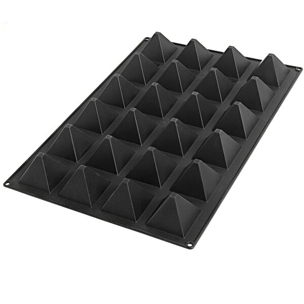 a black plastic mold with pyramids