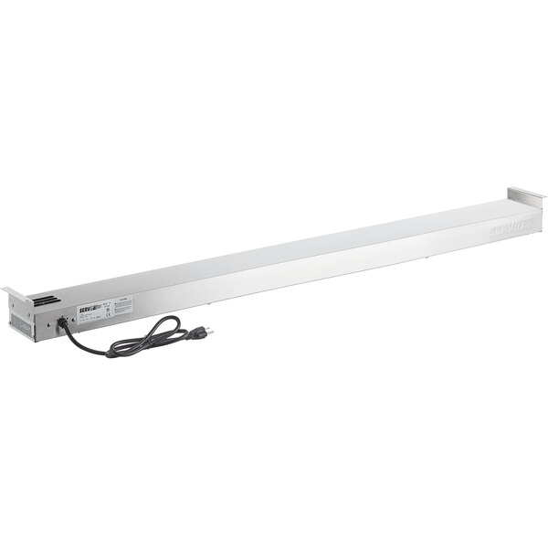 A white rectangular metal ServIt strip warmer with a black cord.