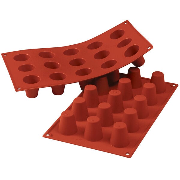 a red silicone tray with cups