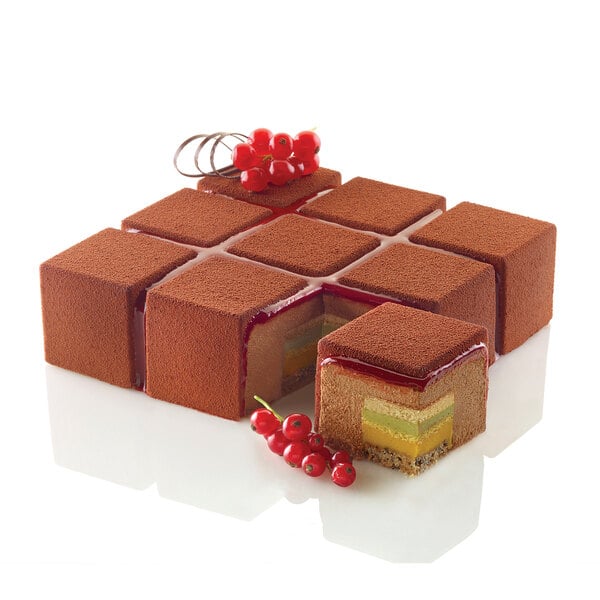 A square chocolate cake with a cut out center.