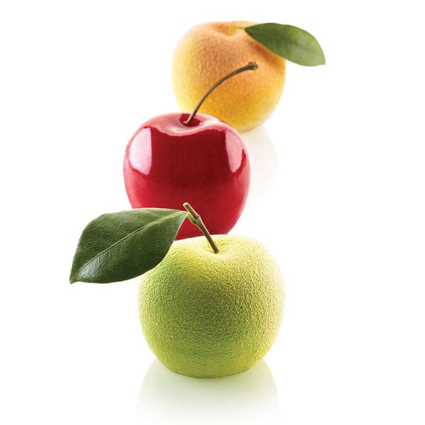 Three 3D apples with green leaves using the Silikomart MELA, CILIEGIA & PESCA silicone baking mold.