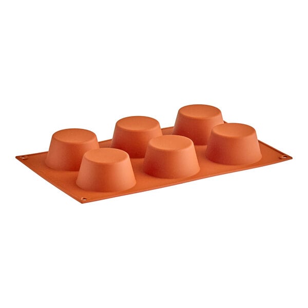 A flexible orange silicone baking mold with six medium-sized muffin compartments.