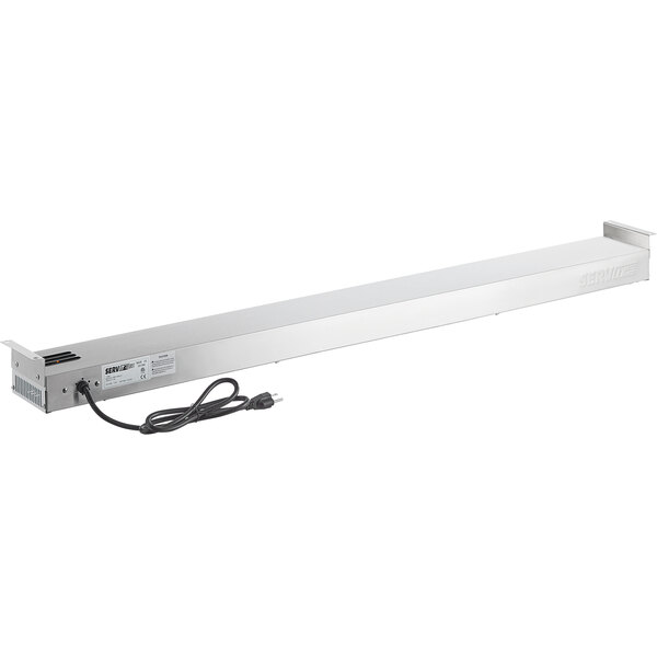 A rectangular metal strip with black cords.