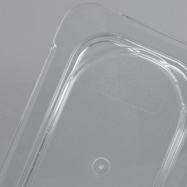 a clear plastic container with a hole