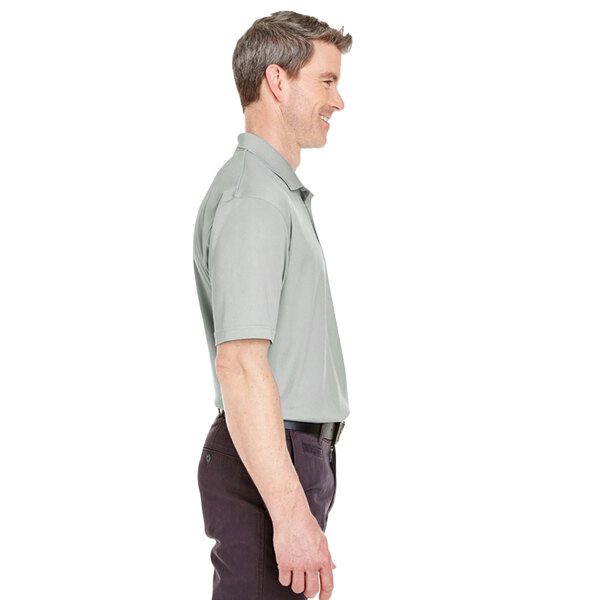 A person wearing a grey Henry Segal short sleeve polo shirt.
