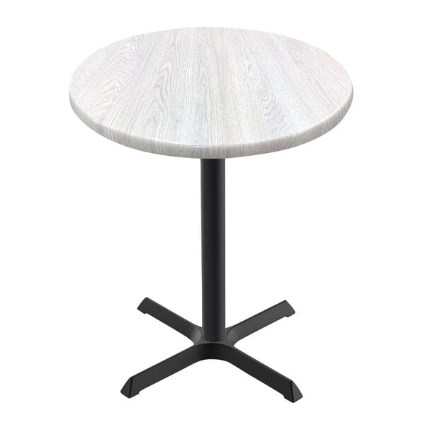 A white Holland Bar Stool EnduroTop table with a white ash wood top and black cross base.