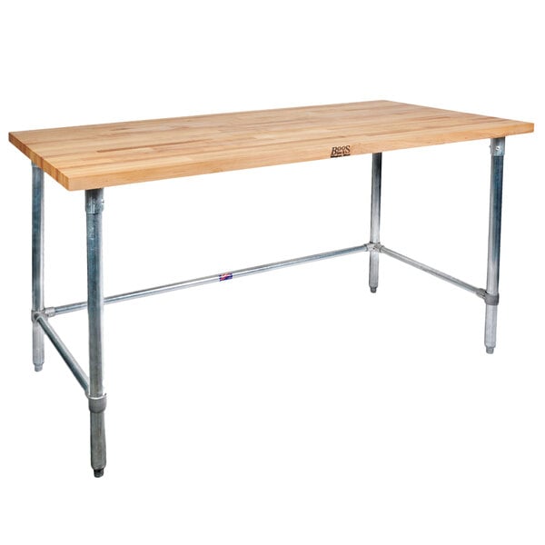 A John Boos wood top work table with a stainless steel base.