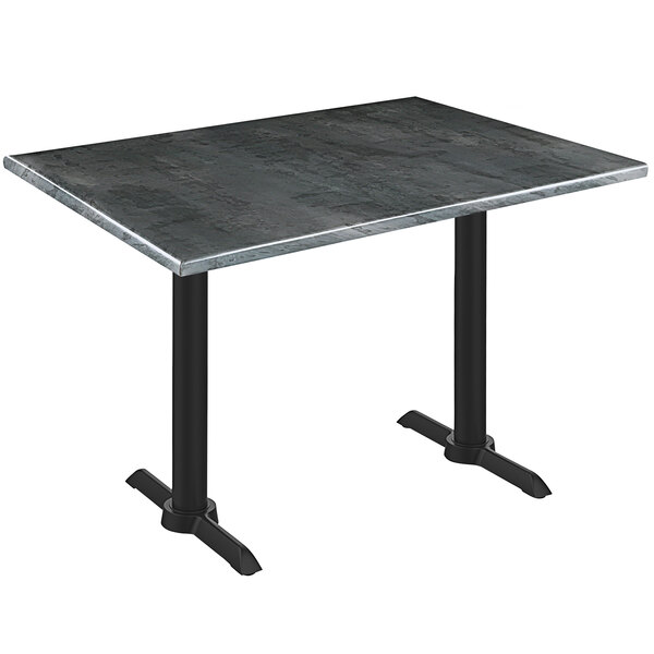 A Holland Bar Stool EnduroTop table with a black steel base and black wood laminate top.