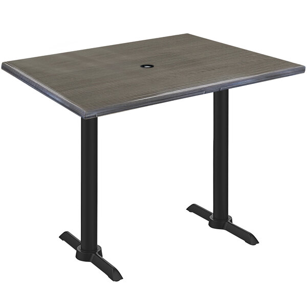 A Holland Bar Stool EnduroTop rectangular table with a charcoal wood laminate top and black base.