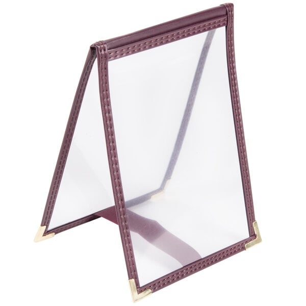 A burgundy sewn edge leather Menu Solutions table tent cover.