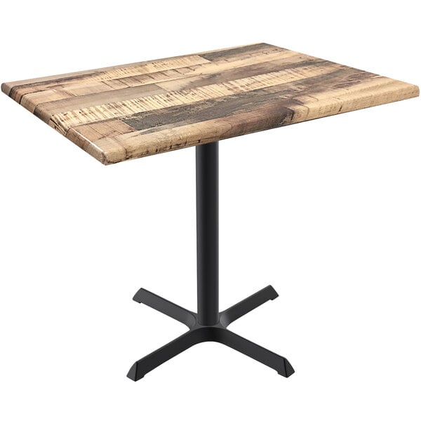 A Holland Bar Stool EnduroTop table with a rustic wood top and black cross base.