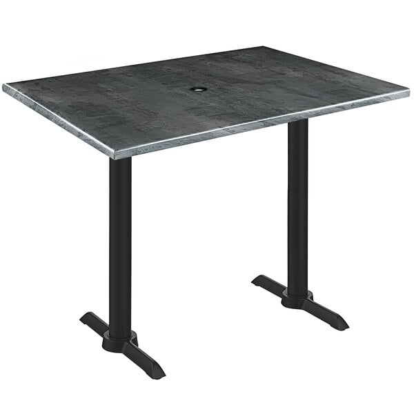 A rectangular Holland Bar Stool black steel wood laminate table with black end column base.