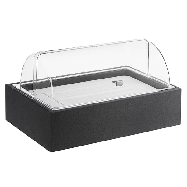 A black box with clear lid on a table in a salad bar.