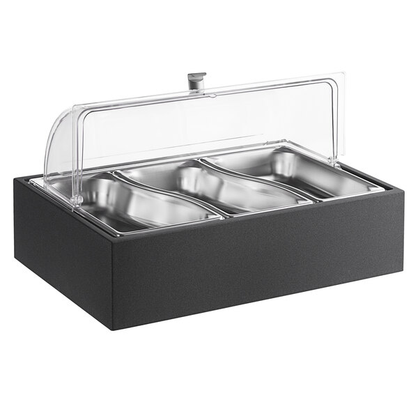 A black metal food warmer with three metal pans inside and a wooden roll top cover.