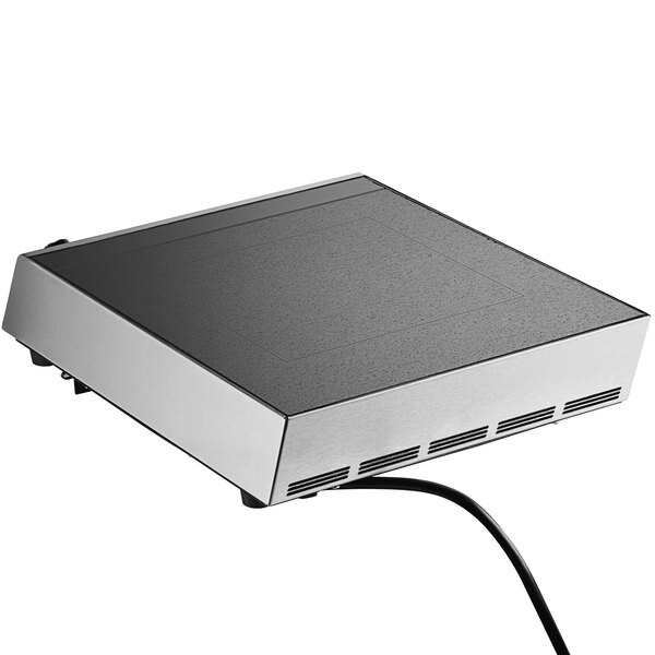 A black rectangular Hatco countertop induction range with a cord.
