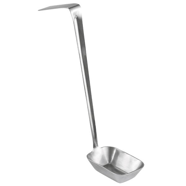 A silver rectangular ladle with a long handle.
