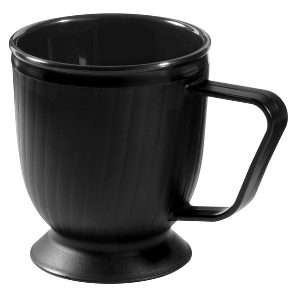A black mug with a pedestal base and a handle.
