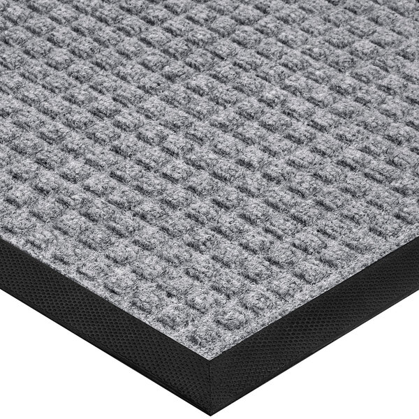 a close-up of a grey carpet