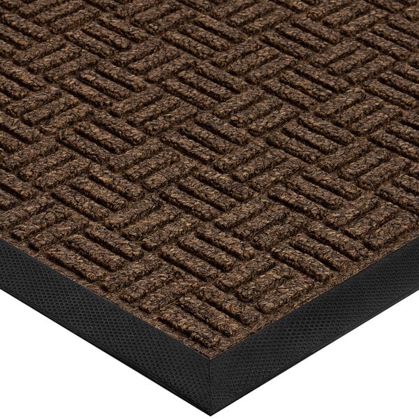 A brown Lavex parquet indoor entrance mat with black trim.