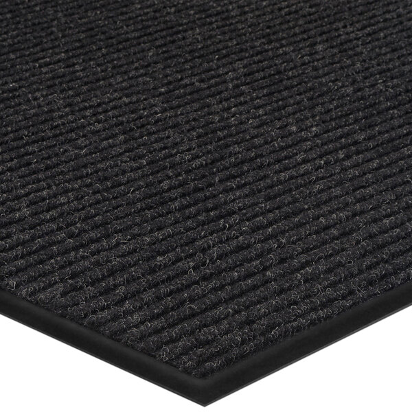 A black Lavex Needle Rib entrance mat with a black stripe.