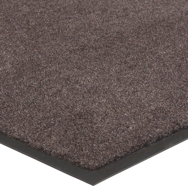 A brown Lavex Olefin indoor entrance mat with a black border.