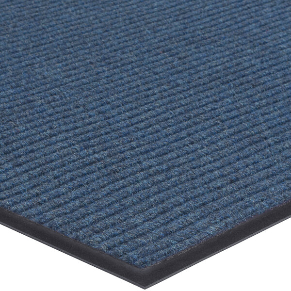 A blue Lavex Needle Rib indoor entrance mat with a black border.