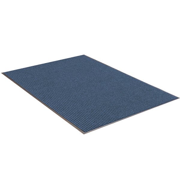 A blue carpeted entrance mat.