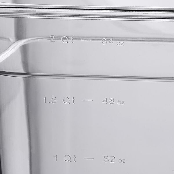 A close up of a Choice clear polycarbonate food pan with measurements.