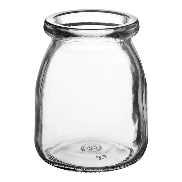 An American Metalcraft round clear glass jar with a lid.