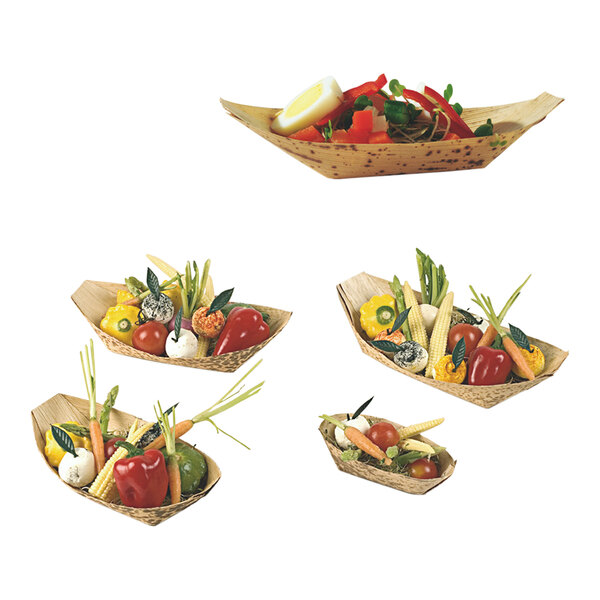 A Solia round thermoformed bowl filled with vegetables on a white background.