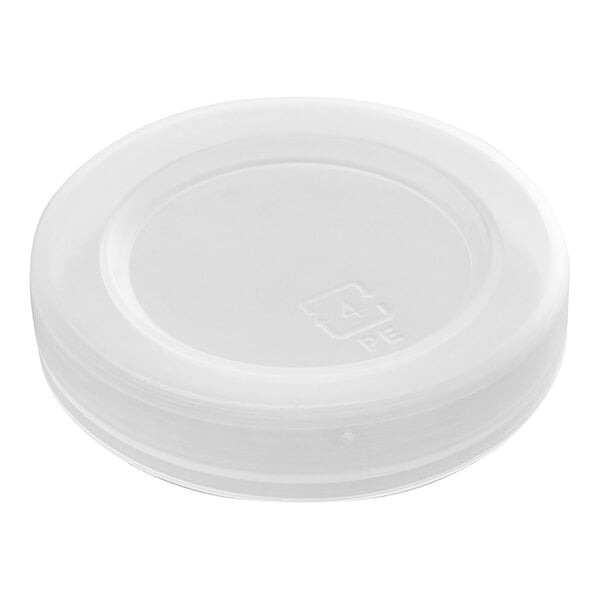 A translucent, round plastic lid with a slightly raised edge and recycling symbol visible on the top surface.