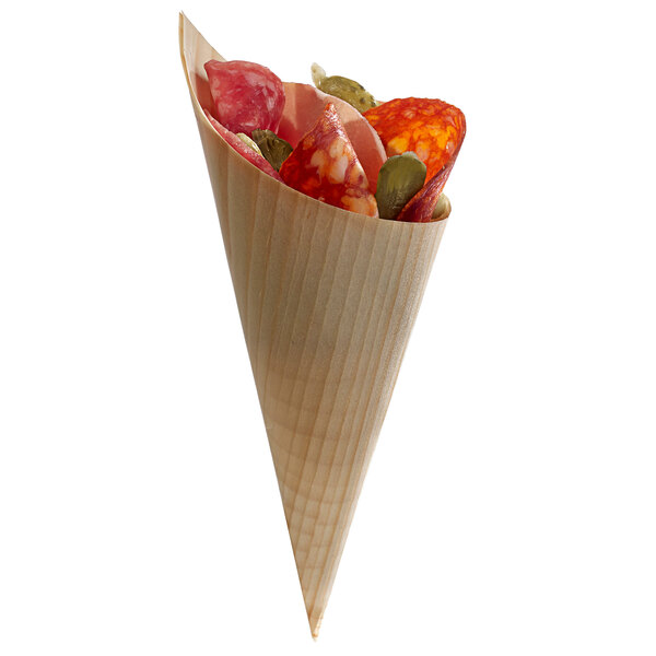 A Solia pine wood cone filled with meat and vegetables.