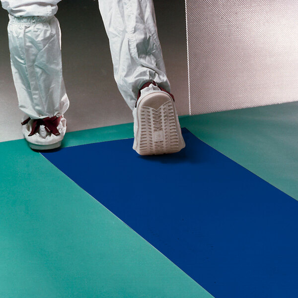 Person walking on a tacky mat