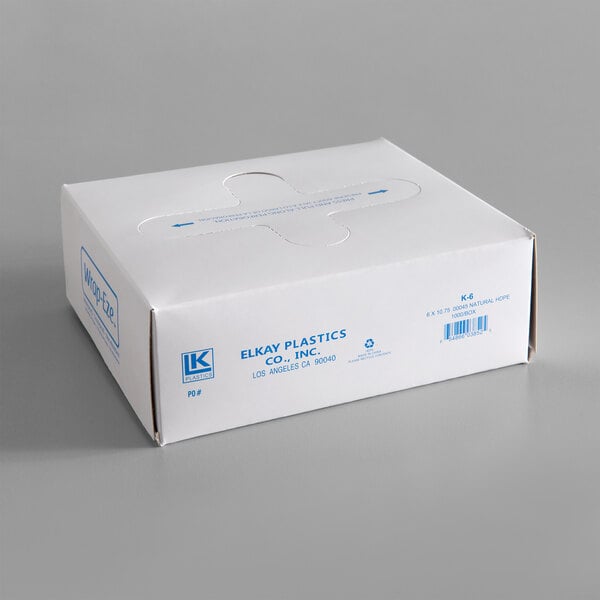 A white box with a cut out hole in the lid.