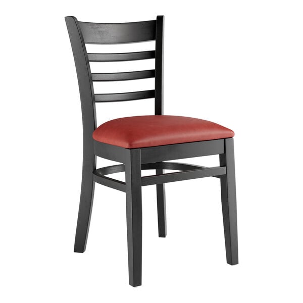 A Lancaster Table & Seating black wood restaurant chair with burgundy vinyl seat.