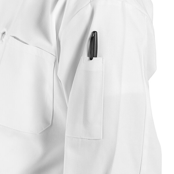 A close up of a white Uncommon Chef Classic Knot long sleeve chef coat.