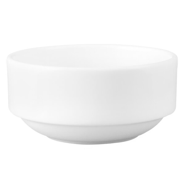 A Chef & Sommelier warm white china bowl with a rolled edge.